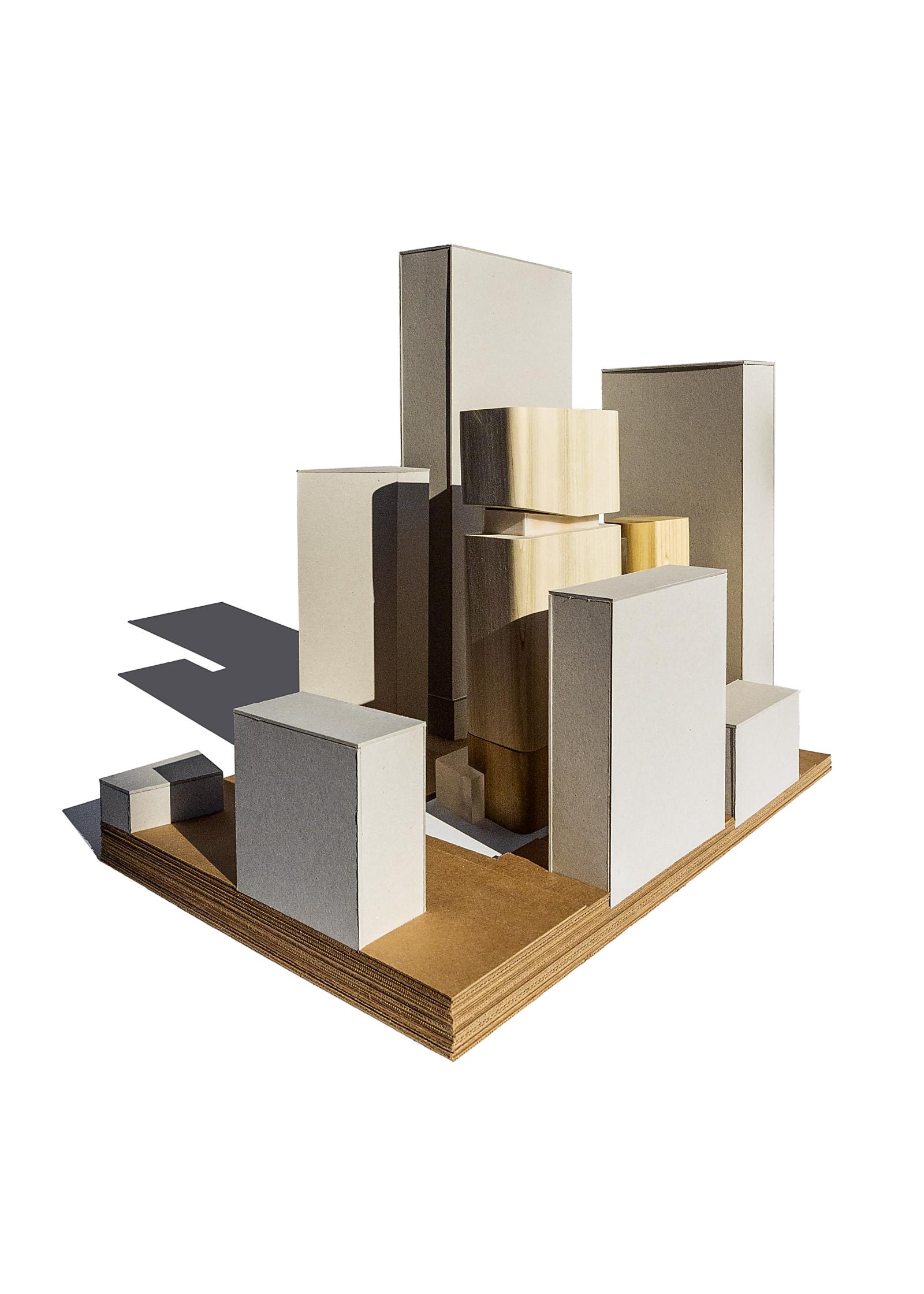 Massing arrangement testing with wood & cardboard