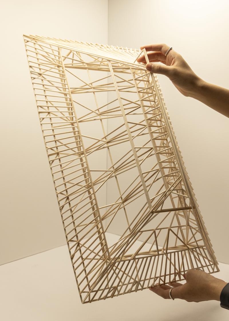 Palapa 1:50 Structural Model - A palapa is a traditional Mexican structure with Indigenous roots, defined by its wide thatched roof and open, breathable form suited to tropical climates. Developed in dialogue with renowned palapa expert Simón Vélez, this study explores its structural logic through a hand-crafted balsa wood model. The act of making becomes a form of knowing, revealing how Indigenous knowledge persists through material practice—offering sustainable responses to environmental conditions and inviting renewed attention to the climatic intelligence embedded in vernacular traditions. 